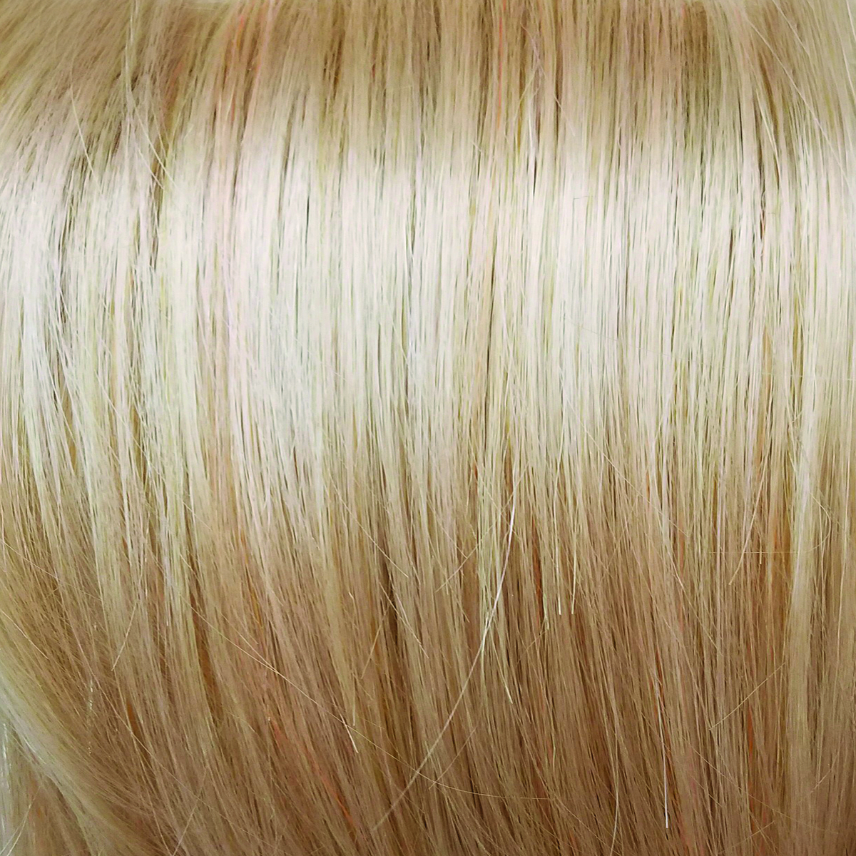 Peach Gold  -  At first glance, this looks like a brilliant medium brown rooted blond, then it pops like a concerto of colored sunbeams with the palest of peaches, limes and lilac pinks. Pastel Rainbow-R is full of surprises.