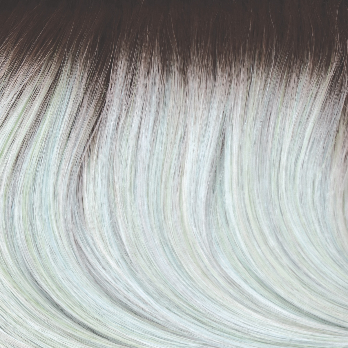 Seaglass-R  -  This beige brown rooted color is captivating. The root seamlessly smudges into a pale peppermint green with hints of blue jade.
